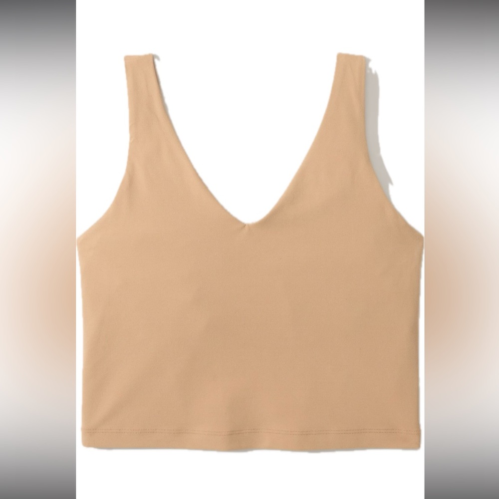 Athleta TRANSCEND V-NECK CROP BRA A-C
Color: Dune, Size XL, yoga, travel, EUC